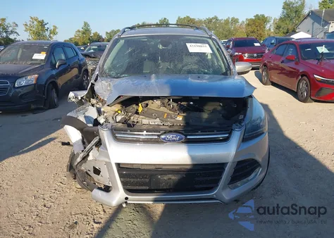 2014 Ford Escape Titanium z USA, uszkodzony, nr VIN 1FMCU9J93EUC80950